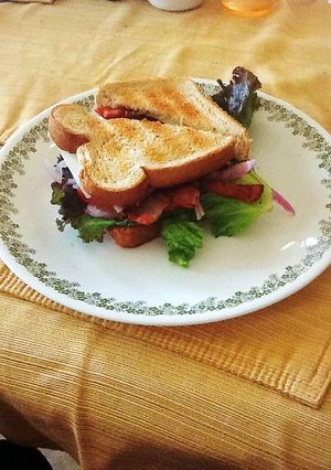 A picture of Grilled Chicken Swiss & Bacon Club Sandwich.