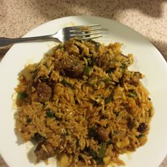 A picture of Sausage rice and veggies.