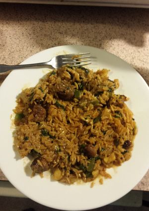 A picture of Sausage rice and veggies.
