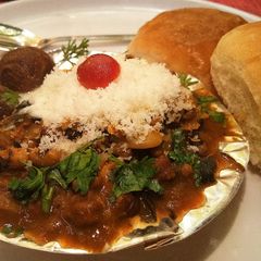 A picture of Gulab Jamun Misal.