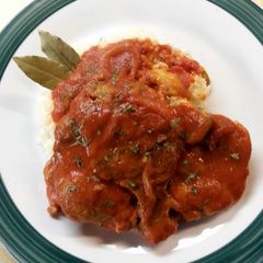 A picture of Smothered Pork Chops In Red Gravy.