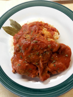 A picture of Smothered Pork Chops In Red Gravy.