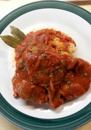 A picture of Smothered Pork Chops In Red Gravy.