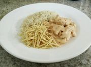 A picture of white rice and chicken