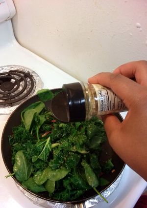 A picture of Saute Kale& Spinach with crab meat.