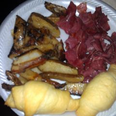 A picture of bacon and home fries.