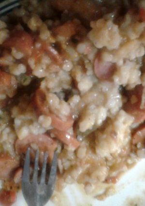 A picture of sausage, shrimp & crab meat gumbo.