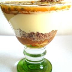 A picture of Caramelized apples, lemon cream, cinnamon crumble with passion fruit.
