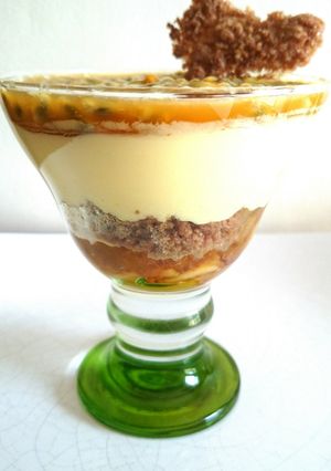 A picture of Caramelized apples, lemon cream, cinnamon crumble with passion fruit.