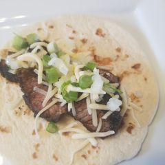 A picture of Korean Skirt Steak Tacos w/ Lemon-Scallion Relish.