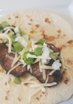 A picture of Korean Skirt Steak Tacos w/ Lemon-Scallion Relish.