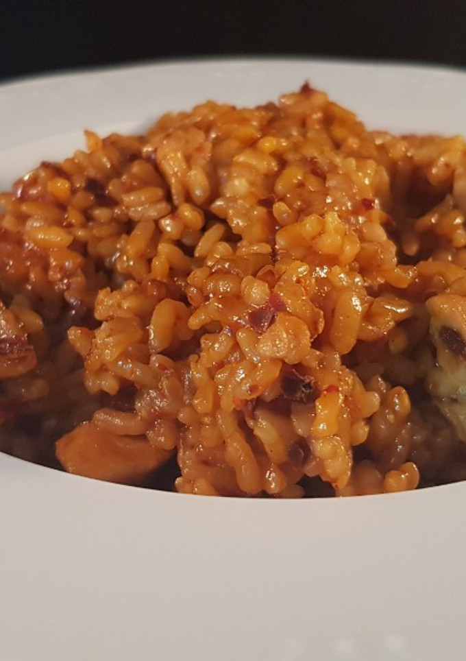 Una foto de Arroz con pollo y ñoras