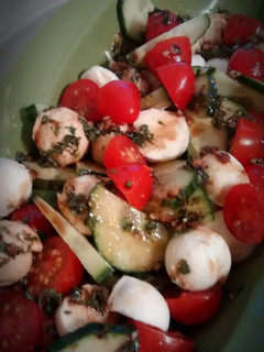 A picture of Red, white, and green salad.
