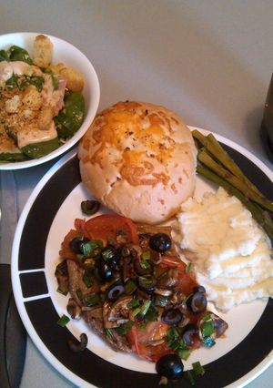 A picture of Steak and veggies.