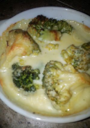 A picture of Broccoli in cheese sauce.