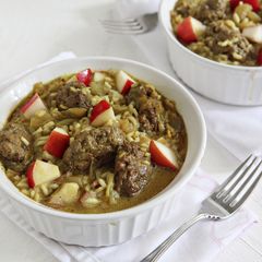 A picture of Curried Guinea Meatballs with Escarole and Basmati Rice.