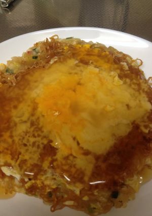 A picture of Chicken Ramen Okonomiyaki with Ankake Sauce.