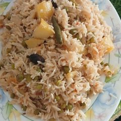 A picture of Aloo, matar, polaw.