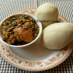 A picture of Pounded yam with ugu/egusi soup.