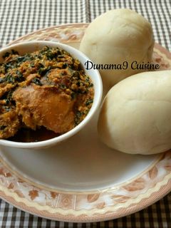 A picture of Pounded yam with ugu/egusi soup.