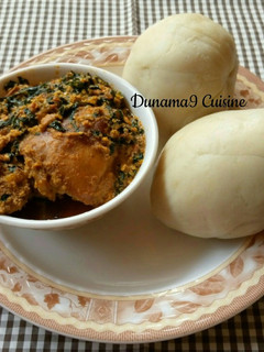 A picture of Pounded yam with ugu/egusi soup.