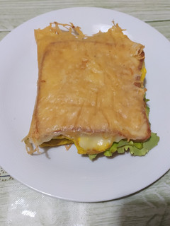 Foto principal de Sándwich mixto vegetal en costra de queso