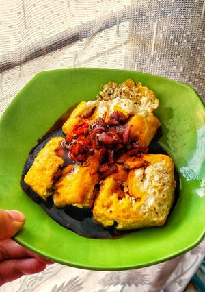 A picture of Fried Yellow Tofu with Sweet Soy Sauce and Chilli.