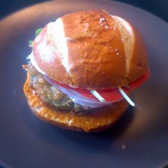 A picture of Fried Green Tomatillo Sandwich with Parsnip Fries.