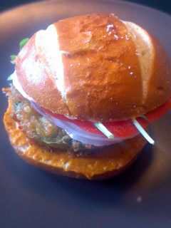 A picture of Fried Green Tomatillo Sandwich with Parsnip Fries.