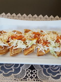 Una foto de Taquitos dorados de papa