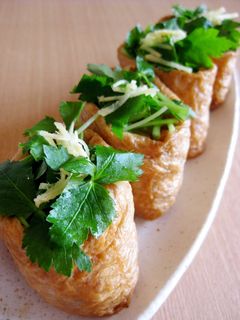 A picture of Inari Sushi with Minced Meat and Bamboo Shoots.