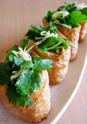 A picture of Inari Sushi with Minced Meat and Bamboo Shoots.