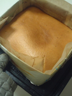 A picture of Castella Cake in a Newspaper Mold.