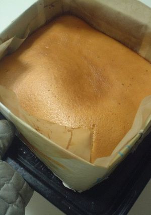 A picture of Castella Cake in a Newspaper Mold.
