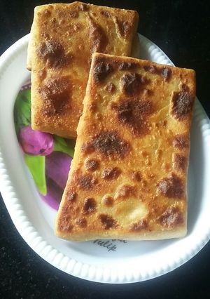 A picture of Mughlai paratha with egg.