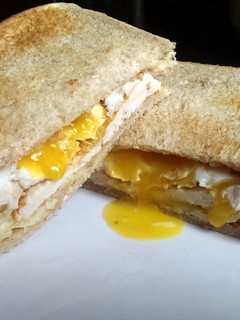 A picture of Sophie's turkey cheese & egg toasted sandwich.