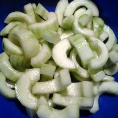 A picture of black salt on cucumbers a refreshing snack.