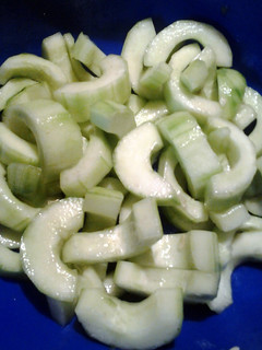 A picture of black salt on cucumbers a refreshing snack.