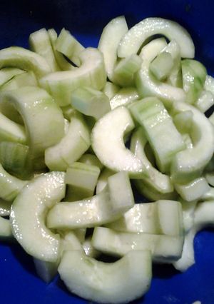 A picture of black salt on cucumbers a refreshing snack.