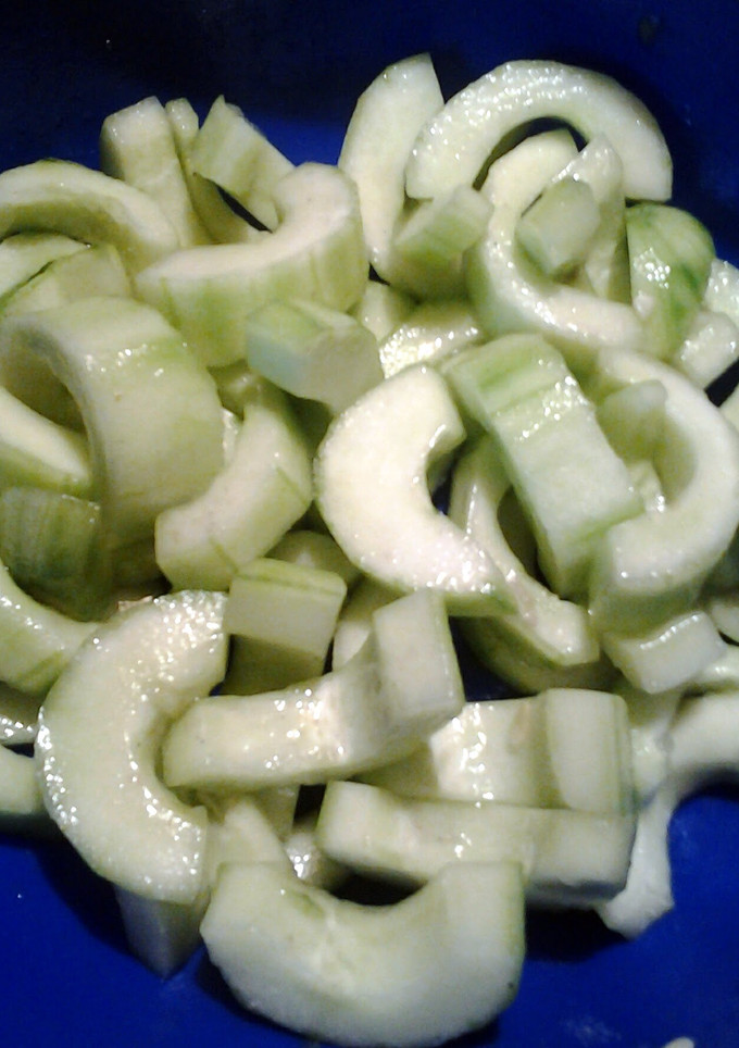 A picture of black salt on cucumbers a refreshing snack.