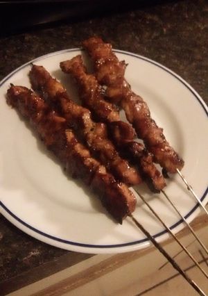 A picture of Pork kebabs on the grill.