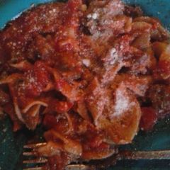 A picture of Spicy sweet Italian sausage spaghetti.