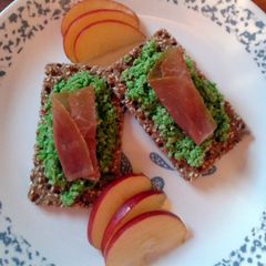 A picture of Fava Bean Spread on a Flat Bread with Prosciutto.