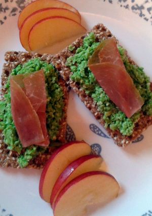 A picture of Fava Bean Spread on a Flat Bread with Prosciutto.
