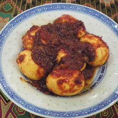 A picture of Sambal Telur (Malaysian-Style Hard Boiled Eggs in Chili Sauce).