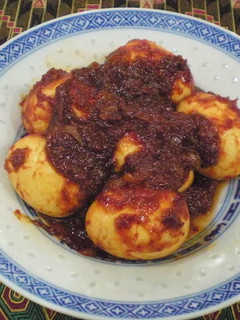 A picture of Sambal Telur (Malaysian-Style Hard Boiled Eggs in Chili Sauce).