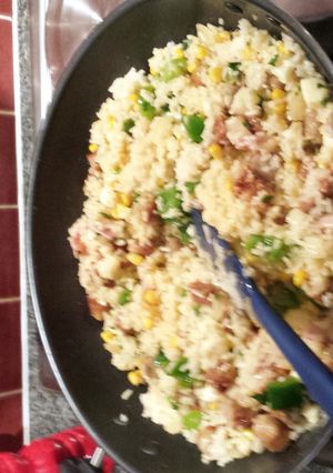 A picture of sausage and bacon risotto.