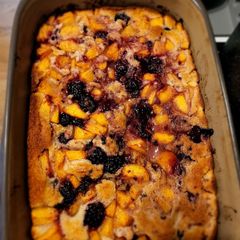 A picture of Peach and Blackberry Cobbler.