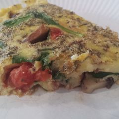 A picture of Tomato, spinach, and mushroom frittata.