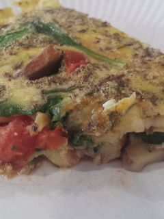 A picture of Tomato, spinach, and mushroom frittata.